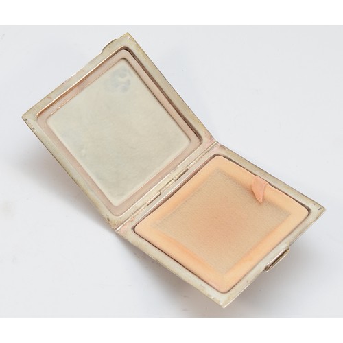 75 - A square silver powder compact, Birmingham 1946, opening to reveal a mirror and powder, 7 x 7cm, 89g... 