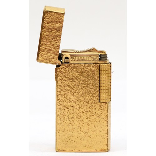 104 - Dunhill, a gold plated rollagas cigarette lighter