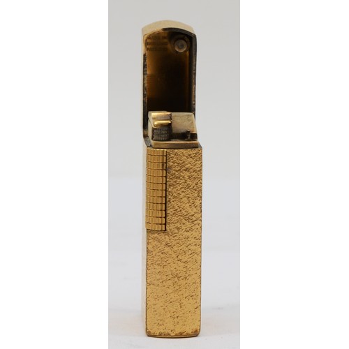 104 - Dunhill, a gold plated rollagas cigarette lighter