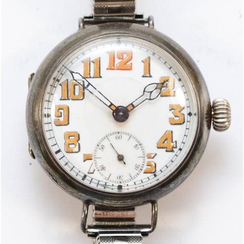 129 - A WWI silver manual wind gentleman's wristwatch, with subsidiary dial, red 12 and luminescent numera... 