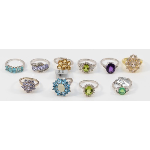 145 - Ten various silver and gemset dress rings, including peridot, sizes N - Q, 37gm