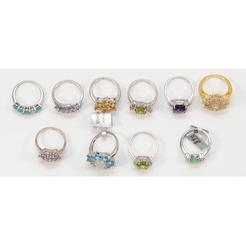 145 - Ten various silver and gemset dress rings, including peridot, sizes N - Q, 37gm