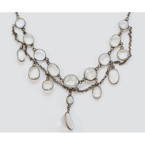 147 - A silver spectacle set moonstone drop necklace, the front 10cm, 37cm overall, 6gm.