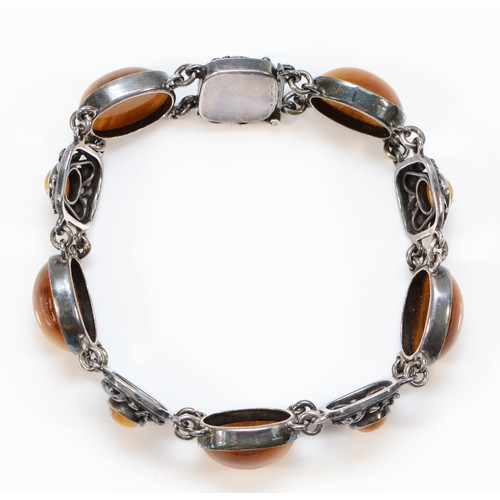 156 - A vintage silver and tigers eye panel link bracelet, Birmingham 1973, 19cm, 27gm