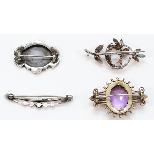 158 - Charles Horner, a silver and enamel brooch, Chester 1912, a Victorian silver and amethyst brooch and... 