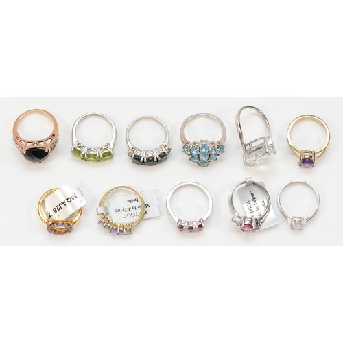 159 - Eleven silver and gemset rings, including topaz, sizes N - P, 41gm