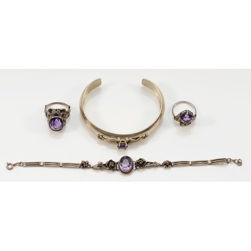 163 - A Sterling Silver and amethyst bangle, an amethyst bracelet and two amethyst rings, 40gm