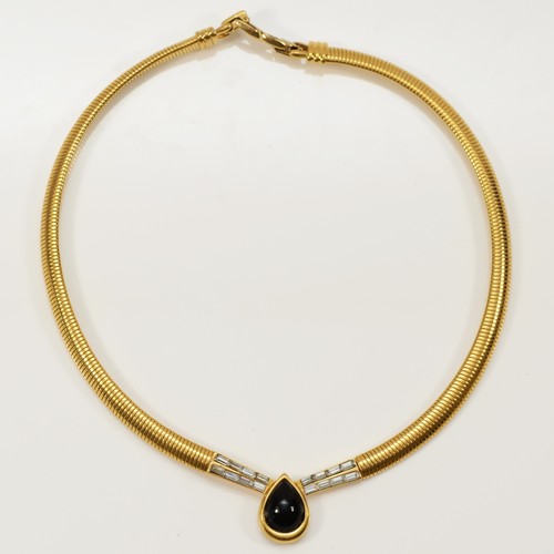 174 - D'Orlan, a gilt metal expanding collar, 46cm.