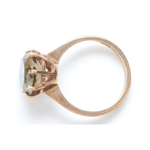 230 - A vintage 9ct gold and smokey quartz dress ring, diameter 10mm, L, 3.2gm