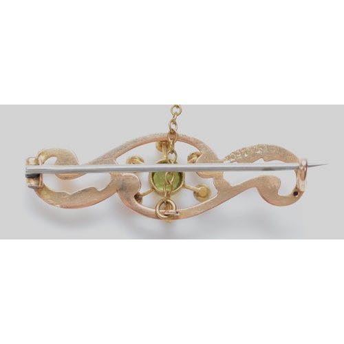 234 - A Victorian 15ct gold peridot and half pearl brooch, 36mm, 2.4gm, metal pin