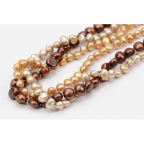 266 - A three row baroque coloured cultured pearl twist necklace, 59cm.