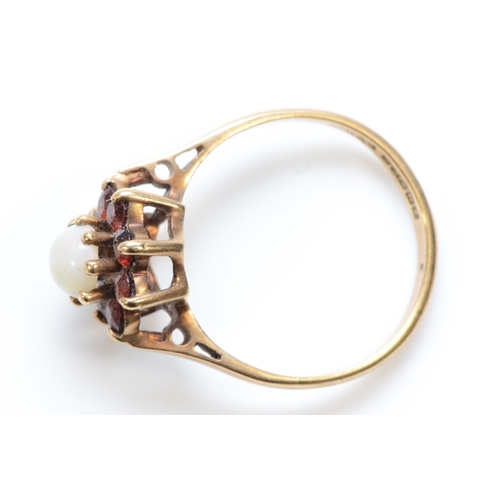 283 - A 9ct gold opal and garnet cluster ring, M, 2.1gm