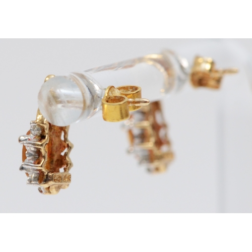 286 - A 9ct gold pair of citrine and diamond ear rings11mm, 1.3gm