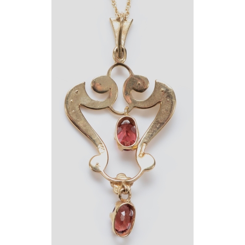 300 - A Victorian style 9ct gold garnet and half pearl set openwork pendant, 40mm, chain, 3.4gm