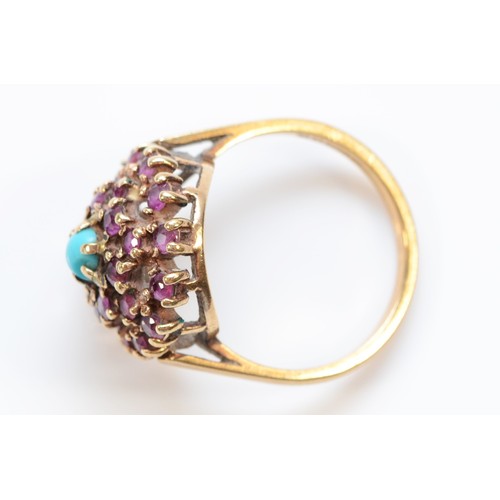 313 - A 9ct gold, ruby and turquoise cluster bombe ring, N 1/2, 3.8g