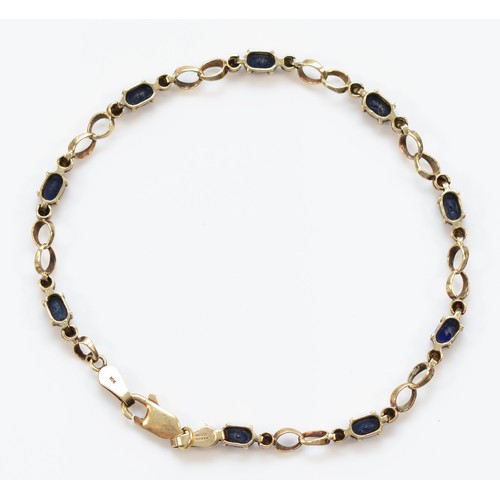 316 - A 10K gold, diamond and sapphire fancy link bracelet, 18cm, 3.8g