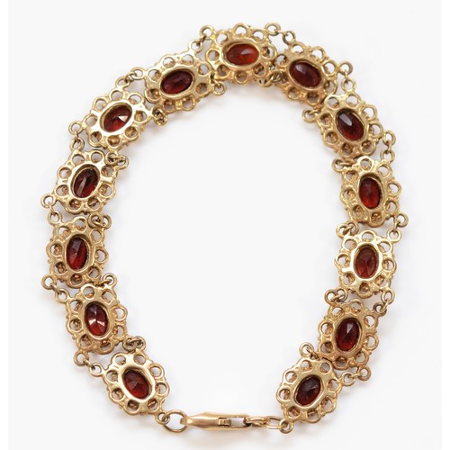 326 - A 9ct gold garnet bracelet, 17cm, 9.6g