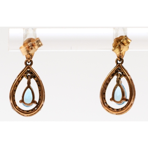 331 - A pair of 9ct gold diamond and topaz drop earrings, 1.6g