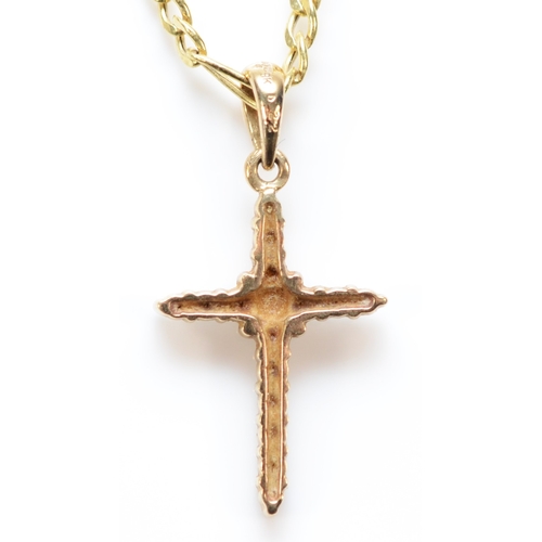 375 - A 9ct gold diamond cross pendant necklace, cross is 18mm in length, 2g