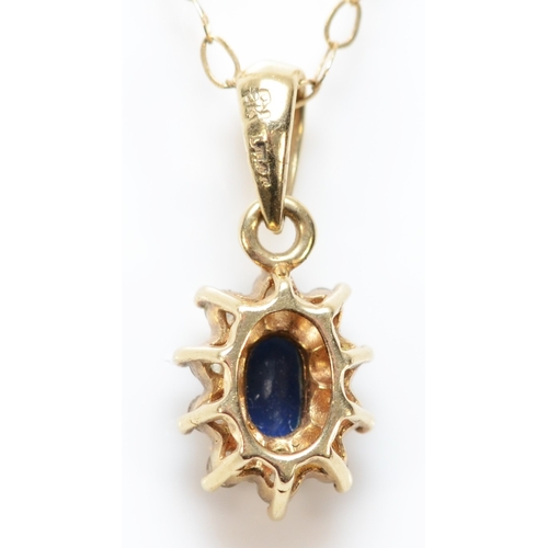 393 - A 9ct gold sapphire and diamond pendant with a 9ct gold chain, pendant measures 10mm, 1.1g