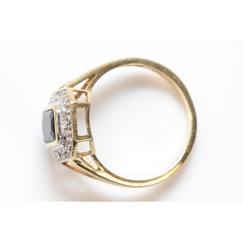 400 - A 9ct gold sapphire and diamond dress ring, K 1/2, 2.7g