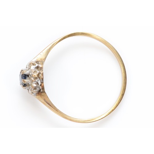 411 - A 9ct gold diamond and sapphire cluster ring, N 1/2, 1.1g