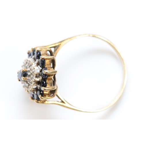 423 - A 9ct gold sapphire and diamond cluster ring, U 1/2,4.2gm