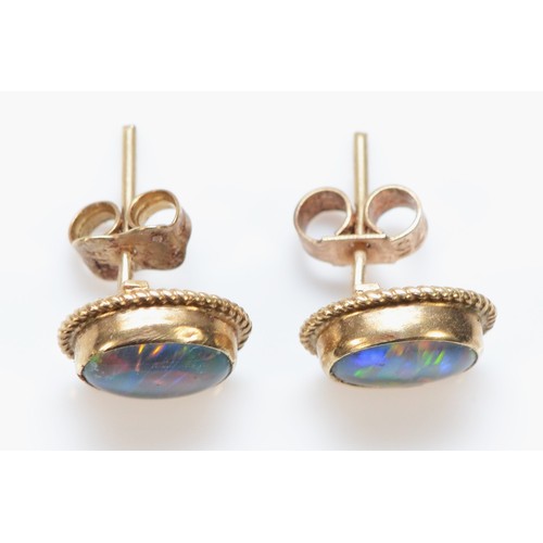 429 - A 9ct gold and black opal doublet/triplet pair of ear studs 1.6gm