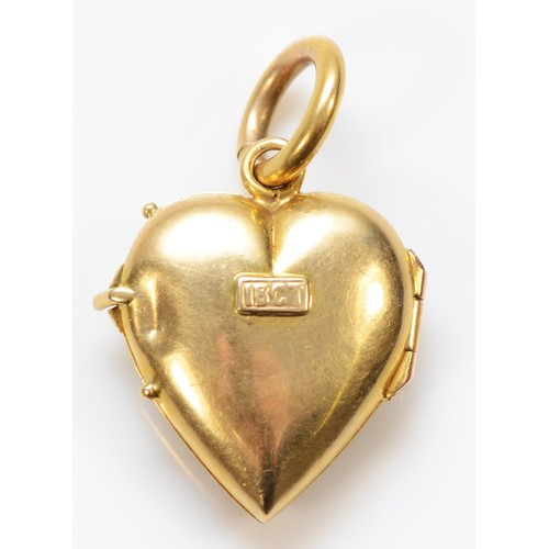 438 - A Victorian 18ct gold half pearl and turquoise heart shape locket/pendant, original fitting to one s... 