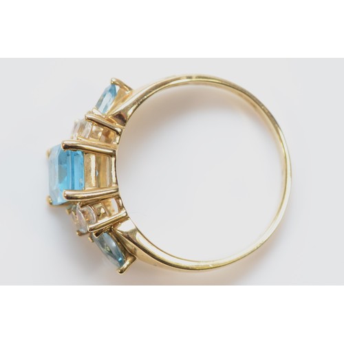 443 - A 9ct gold blue and white stone dress ring, Q, 3.4gm