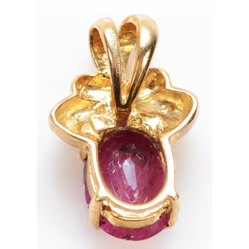 444 - A 9ct gold ruby and brilliant cut diamond pendant, stone 9 x 7mm, 2.1gm