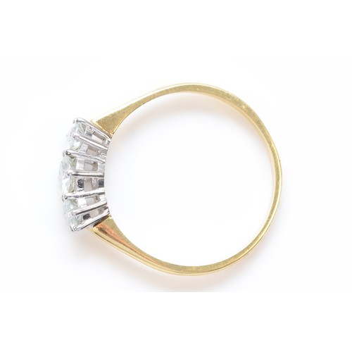 461 - An 18ct gold three white stone ring, V, 3.2gm