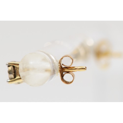 466 - A 9ct gold pair of illusion set diamond ear studs, 0.5gm