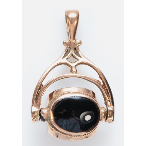 467 - A 9ct rose gold triplet swivel seal, black opal doublet, carnelian and onyx, 26mm, 3.9gm