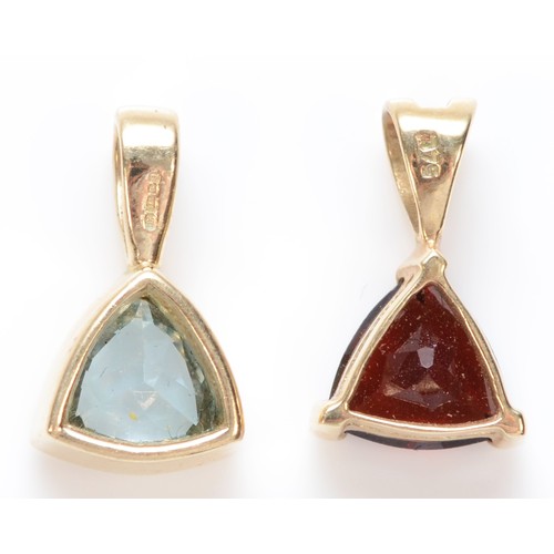 473 - A 9ct gold and garnet set triangular pendant and a similar topaz example, 2gm