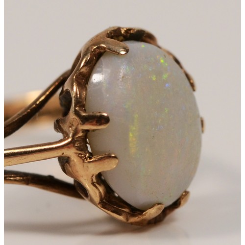 476 - A vintage 9ct gold and opal single stone ring, 10 x 8mm, N 1/2, 2.3gm, stone with surface scratches