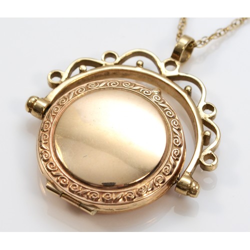 494 - A 9ct gold swivel locket pendant, chain, 5.1gm