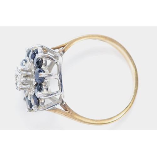 508 - A vintage 9ct gold sapphire and diamond cluster ring, O, 4.1gm