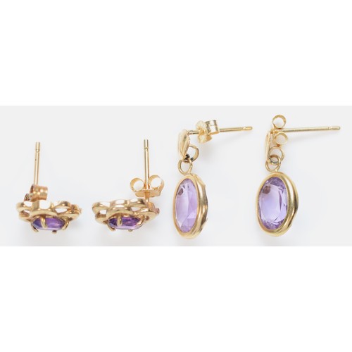 516 - Two pairs of 9ct gold and amethyst ear rings, 1.7gm