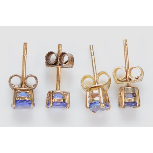 520 - Two pairs of 9ct gold and tanzanite ear studs, 2gm