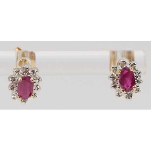 525 - A 9ct gold pair of ruby and diamond ear studs, 1.2gm