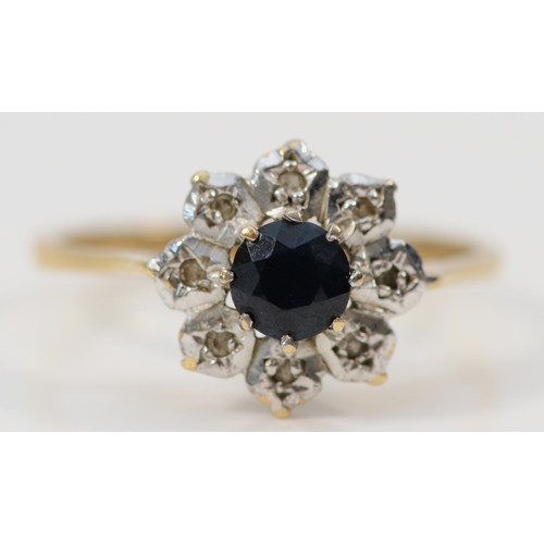 530 - A 9ct gold sapphire and diamond cluster ring, P, 2.3gm.