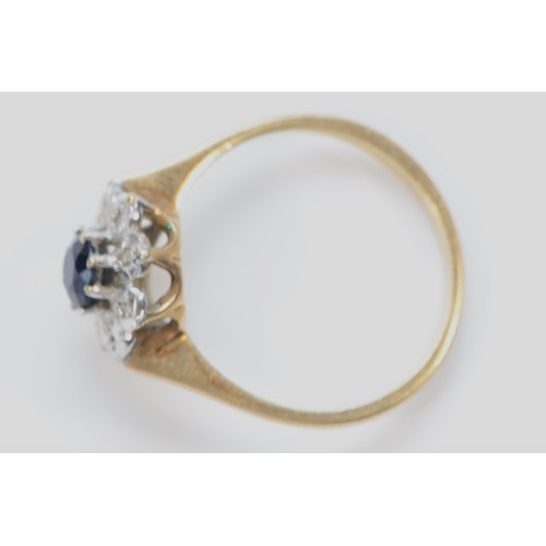 530 - A 9ct gold sapphire and diamond cluster ring, P, 2.3gm.