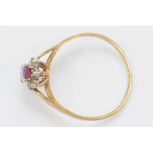 531 - A 9ct gold ruby and diamond cluster ring, M, 1.3gm