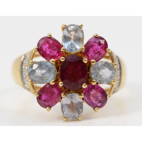 534 - A 9ct gold ruby and aquamarine cluster ring, with brilliant cut diamond set shoulders, Q, 4.7gm