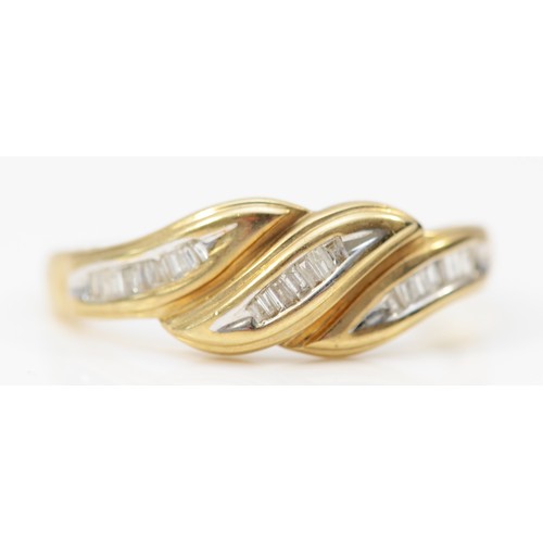 537 - A 9ct gold three row baguette diamond dress ring, S, 2.3gm