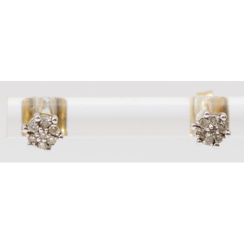 545 - A 9ct gold pair of diamond cluster ear studs, 0.9gm