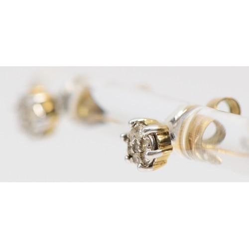 545 - A 9ct gold pair of diamond cluster ear studs, 0.9gm