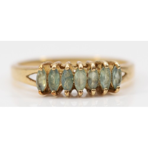 553 - A 9ct gold seven stone chrysoberyl ring, N 1/2, 1.9gm