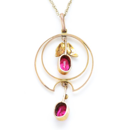 555 - An Edwardian 9ct gold, synthetic ruby and seed pearl pendant42mm overall, chain, 4.5gm